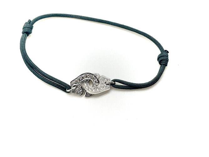 Bracelet DINH VAN - Bracelet Menottes R12 avec diamants, sur cordon 58 Facettes M9044