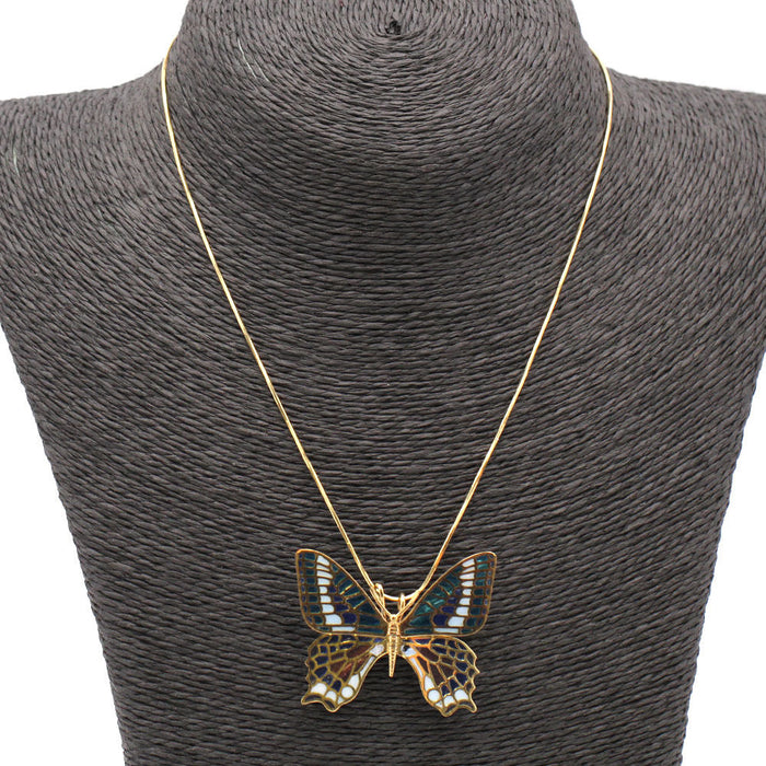 Butterfly in gold and enamel. Dual function