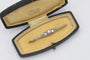 Gold brooch with old-cut diamonds 0.95 ct and a pearl 58 Facettes 10611