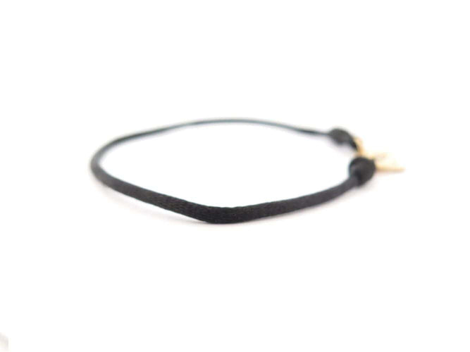 Bracelet bracelet DINH VAN menottes r10 341102 en or jaune 18k 2.9gr & cordon noir 58 Facettes 270151