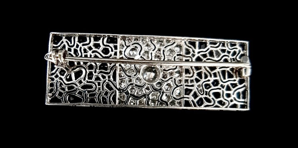 Broche Broche Art Déco en platine sertie de saphirs et diamants 58 Facettes