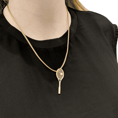 Pendentif Pendentif « Raquette », or jaune, perle. 58 Facettes 34804