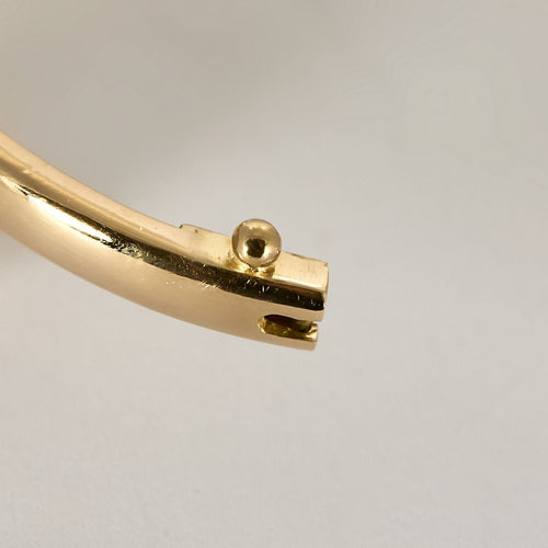 Armband "Schlange" aus Gelbgold, Rubinen und Smaragden 58 Facettes BIA1213