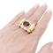 Bague 54 Bague "tank", deux tons d'or, grenat et diamants. 58 Facettes 34577