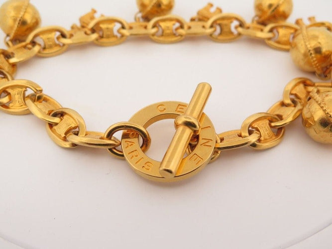 Collier vintage collier CELINE breloques arc de triomphe & spheres logo dore 58 Facettes 260608