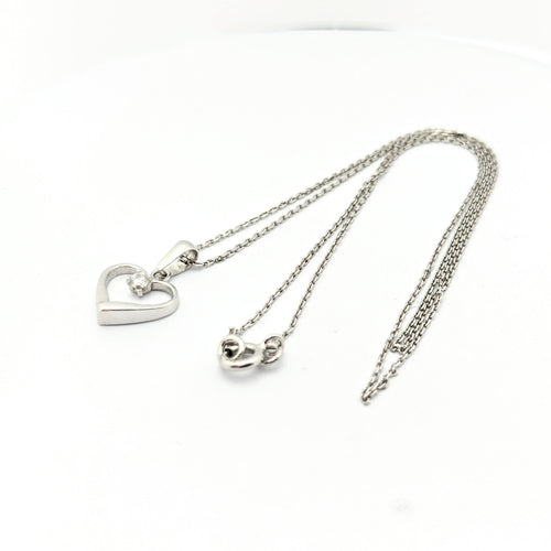 Collier Collier cœur en or blanc et diamant 58 Facettes 30079