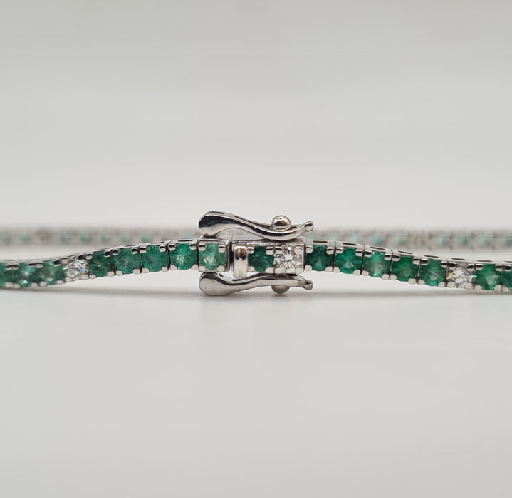 Bracelet Rivière or blanc sertie de diamants et émeraudes 58 Facettes