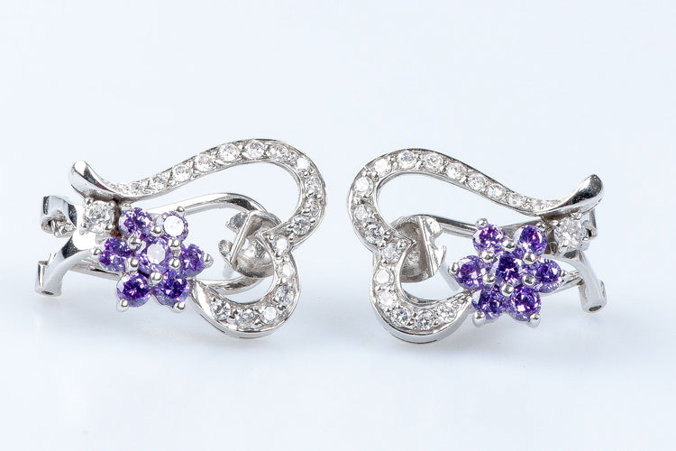 Bague Bague coeurs et fleurs en or blanc 18 carats 58 Facettes 111.20995-53