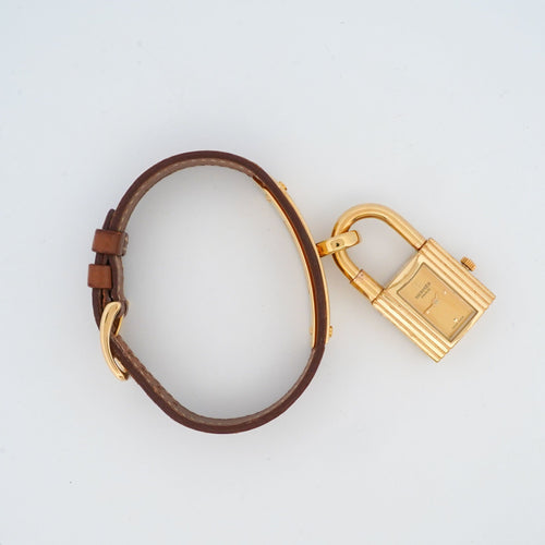 Montre Hermès - Montre Kelly cadran champagne en acier doré et verre saphir 58 Facettes