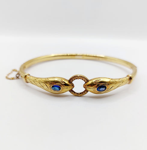 Bracelet Bracelet serpent à deux têtes or jaune et pierre bleues (circa 1920) 58 Facettes A06347