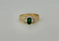 Bague 57 Bague or jaune, émeraude et diamants 58 Facettes