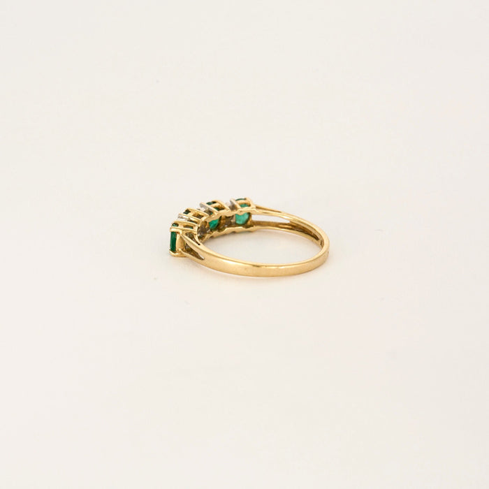 Yellow gold emerald river ring