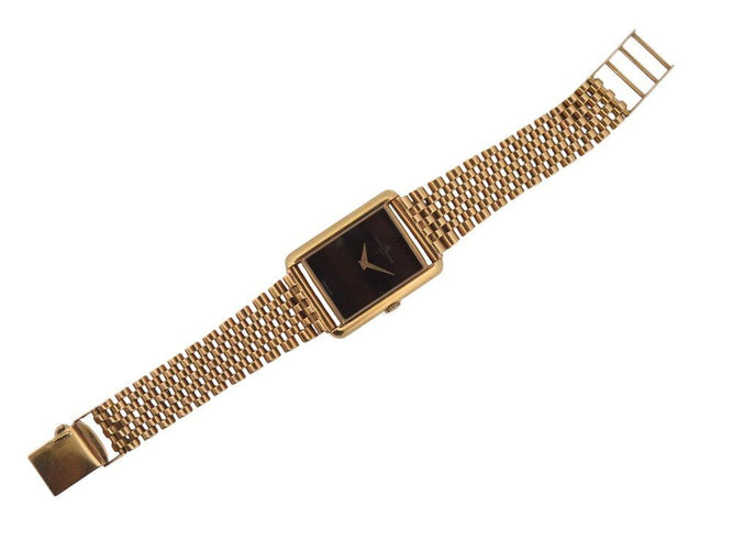 Montre vintage montre baume & mercier tank 37077 mecanique or 18k & oeil de tigre 58 Facettes 268283