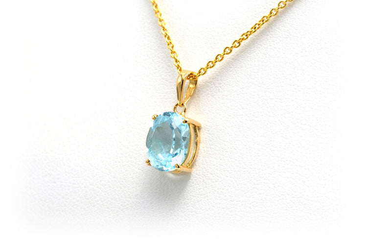 Pendentif Pendentif contemporain or jaune et aigue-marine 58 Facettes B719