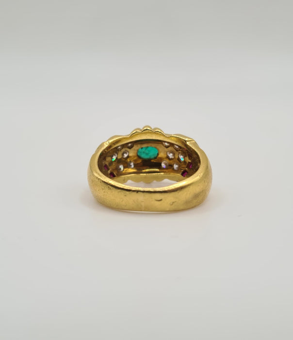 Yellow gold ring set with emerald, diamonds and rubies