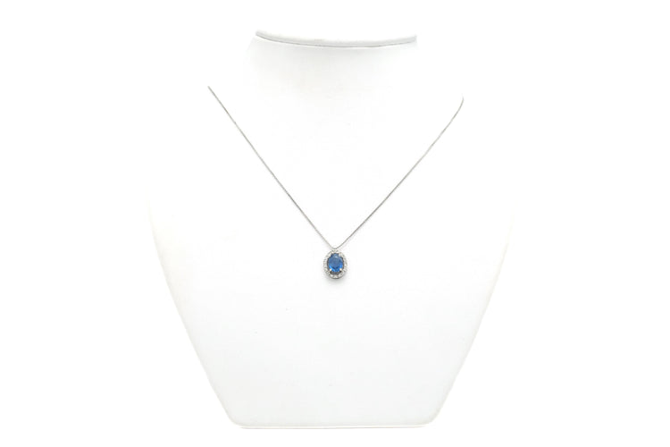 Collier Collier contemporain en or blanc 18 carats serti d'un saphir et de diamants 58 Facettes 21886