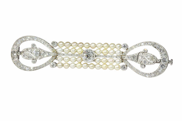 Broche L'élégance d'une époque : une exquise broche en diamants et perles datant de l'aube de l'Art déco 58 Facettes 18115-0042
