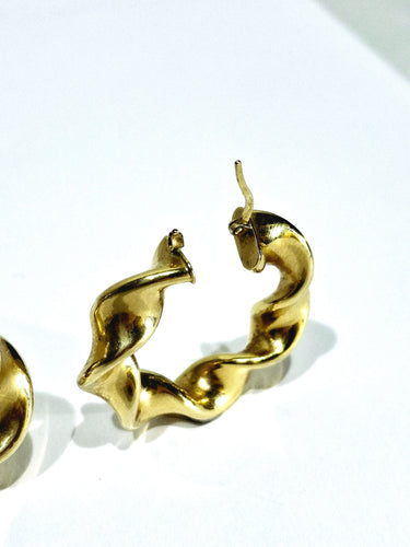 Boucles d'oreilles Paire de créole torsadées en or 58 Facettes