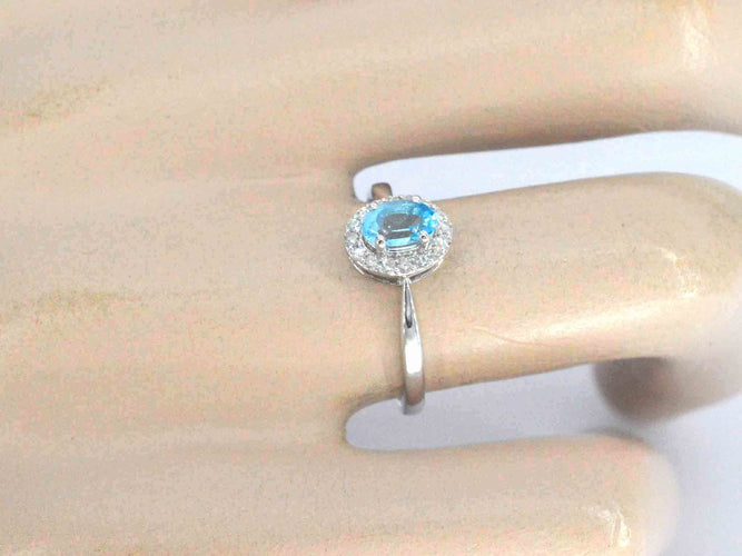 Bague Bague en or blanc avec une topaze bleue et des diamants naturels 58 Facettes 2367