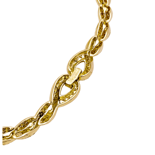 Collier Collier vintage Fred, or jaune et diamants. 58 Facettes 34720