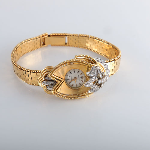 Montre Montre Rolex "dissimulée" or jaune diamants 58 Facettes