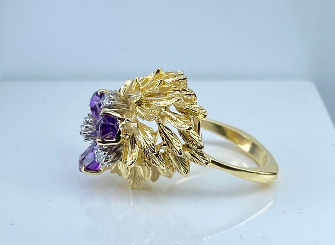 Boucles d'oreilles 50 Bague et boucles d’oreilles en or 18 carats, améthystes et diamants 58 Facettes AB506