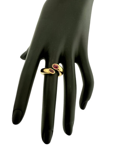 Bague 51 CARTIER - Bague Ellipse en or jaune Deux têtes croisées avec rubis 58 Facettes