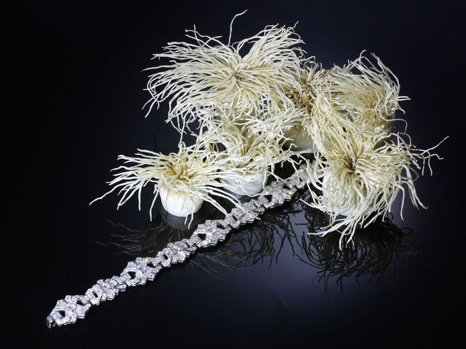 回声 Art Deco ：一款比利时的铂金 1950年代手链 