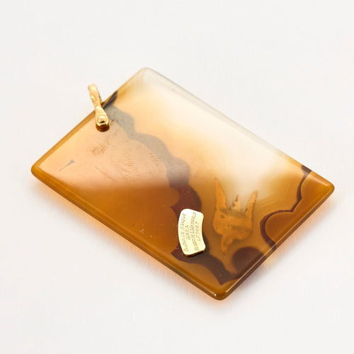 Pendentif Pendentif en agate, motif d'oiseau en or jaune reprenant une gouache de Georges Braque 58 Facettes 250110