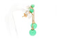 Contemporary earrings in 14-carat yellow gold set with jade 