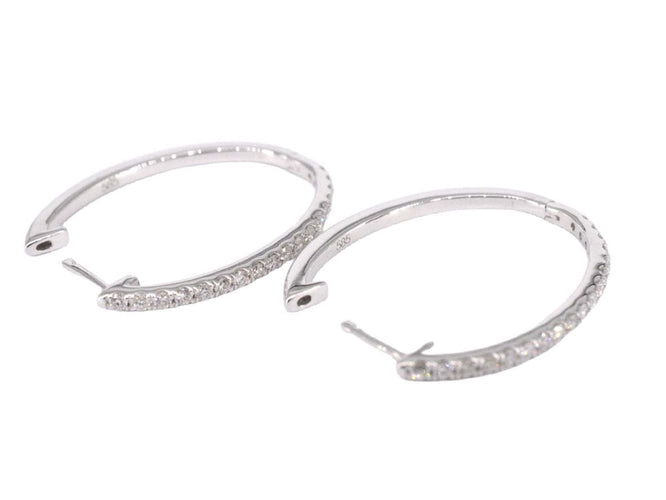 Boucles d'oreilles Boucles d'oreilles créoles en or blanc avec diamants 58 Facettes 2051