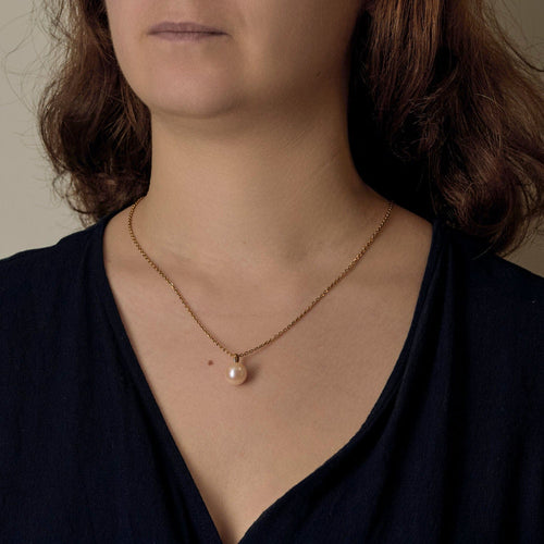 Pendentif Pendentif en or avec perle de culture 58 Facettes