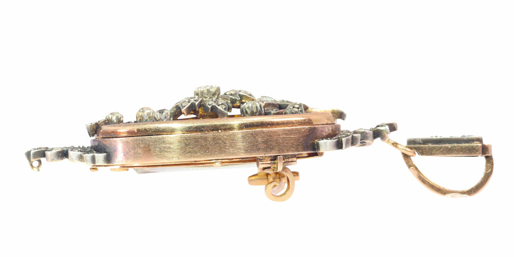 Pendentif Polyvalence victorienne : une broche-pendentif en diamant de 1850 58 Facettes 22112-0187