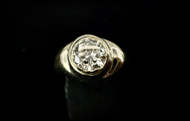 Bague 53.5 Bague Jonc en or jaune sertie d'un diamant de 0,85 carat (VS-E/F) 58 Facettes