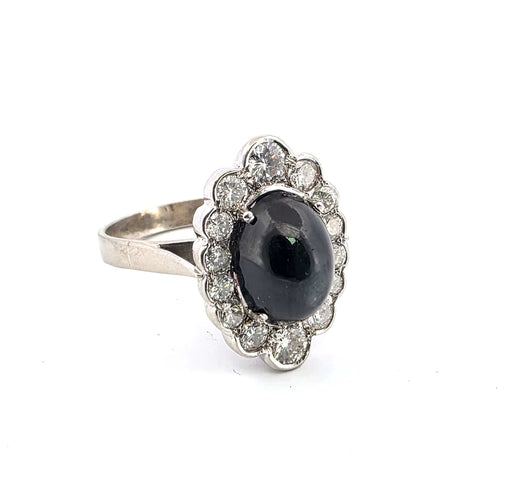 Bague 53 Bague en or blanc avec saphir cabochon et diamants 58 Facettes