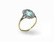 54 Bague Marguerite en or jaune, platine, aigue-marine et diamants 58 Facettes