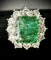Bague 56 Bague or blanc sertie d'une émeraude de 4 carats entourée de 2,40 carats de brillants 58 Facettes