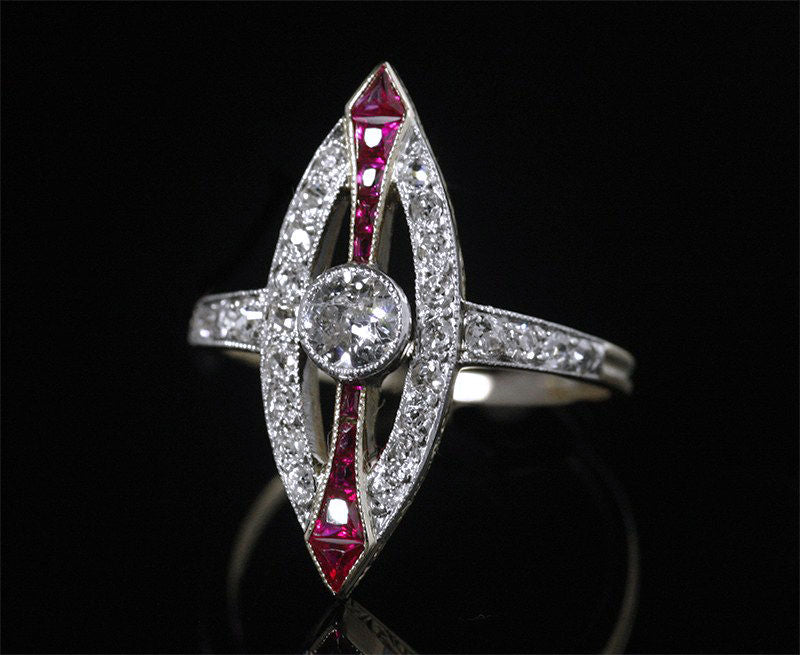 Gold marquise ring, platinum, diamonds and rubies Art Deco