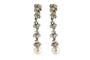 A unique pair of earrings with pearls and diamonds. 