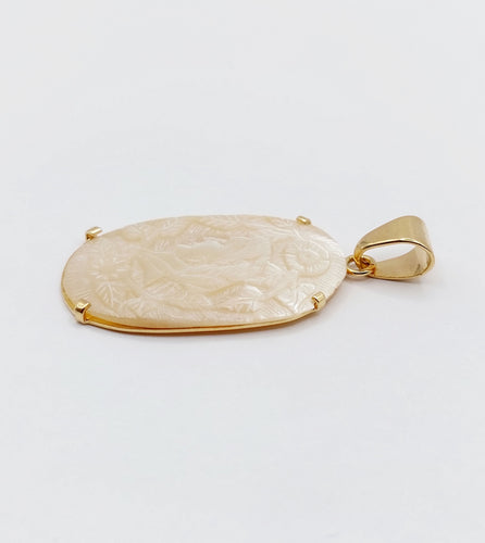 Pendentif Pendentif vintage or jaune ornée d'une plaque de nacre 58 Facettes A04713