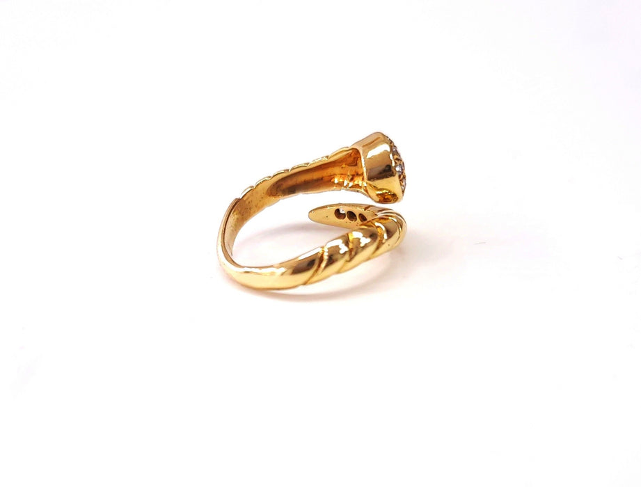 Gold and diamond snake ring