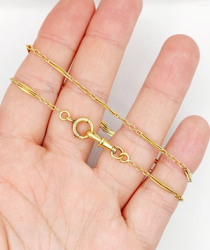 Chaîne giletière de montre antique or jaune 18k maillons finement travaillés (circa 1900) 58 Facettes A05186