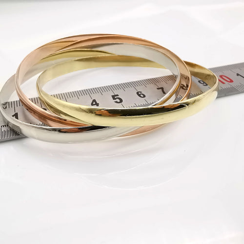 18 karat tricolor armbånd