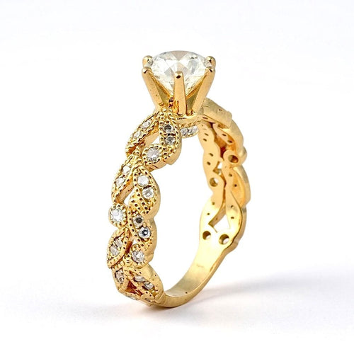 Bague 47 Solitaire en or jaune et diamants, feuilles de 58 Facettes