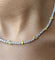 Collier Collier tennis en or blanc 18 carats avec diamants jaunes 58 Facettes G-439