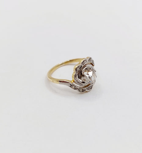 Bague 43 Bague tourbillon antique en or 18k et platine, diamant ancien 0,30 ct et roses 58 Facettes A06352