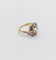 Bague 43 Bague tourbillon antique en or 18k et platine, diamant ancien 0,30 ct et roses 58 Facettes A06352