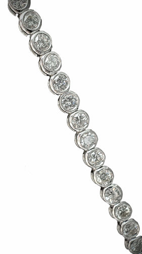 Bracelet Bracelet rivière or blanc serti de 54 brillants de 0,10 carat chacun 58 Facettes