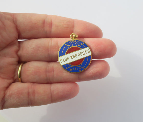 Pendentif Pendentif ancien globe terrestre New York Life insurance Company émail 58 Facettes