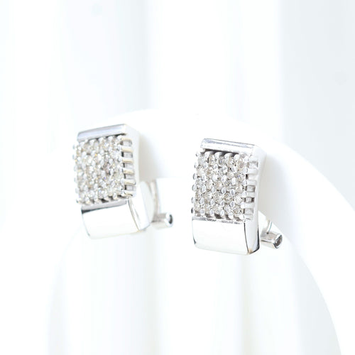 Boucles d'oreilles Boucles d'oreilles en or blanc serties de diamants taille brillant 58 Facettes J010000312